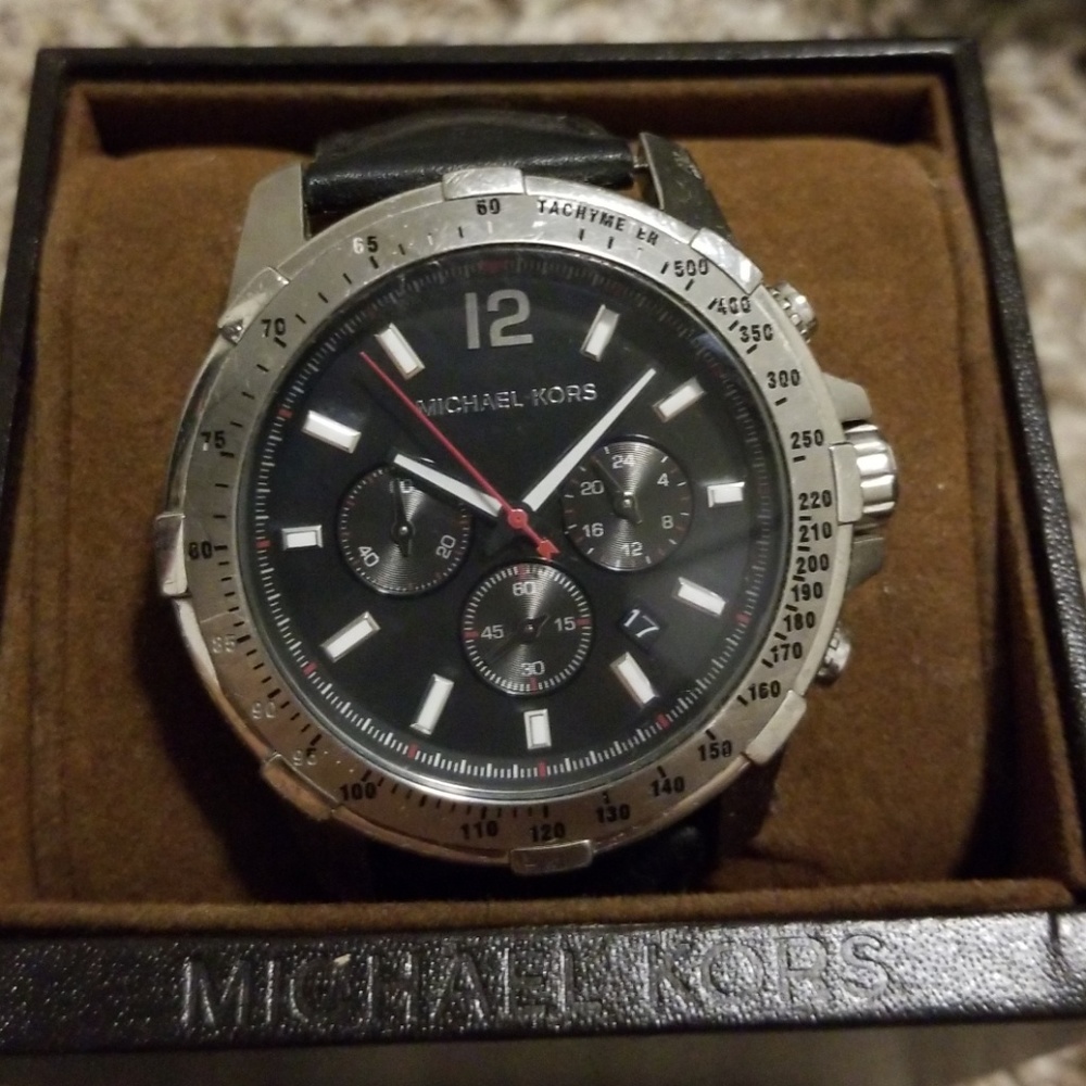 Mens black leather watch.